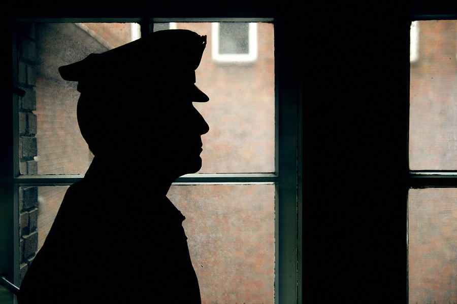 Silhouette of a prison/police warden Photograph by Klubovy