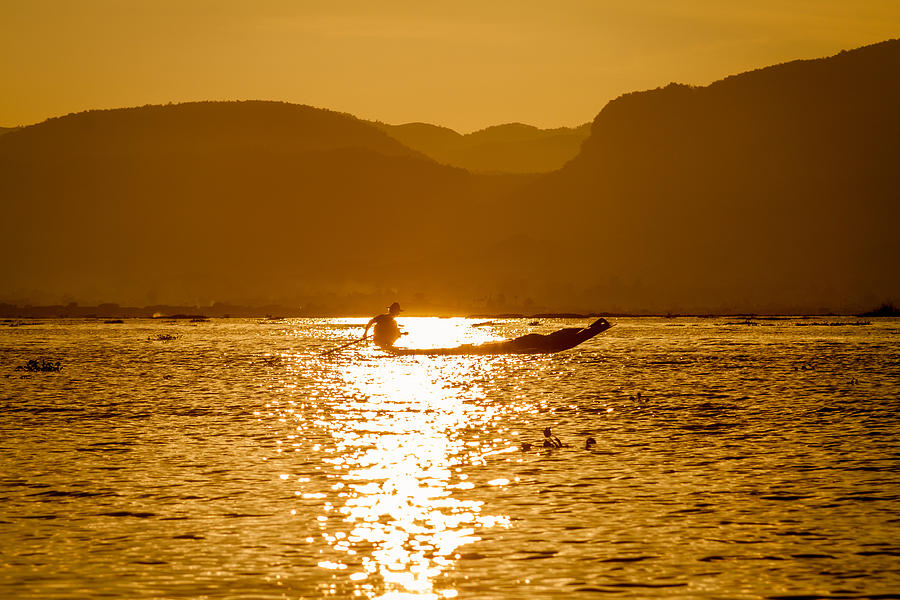 Flower Photograph - Silhouette of an Inle Lake Fisherman by Seth Weisel