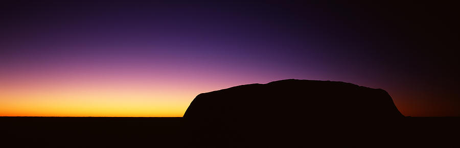 Nature Photograph - Silhouette Of Ayers Rock Formations by Panoramic Images