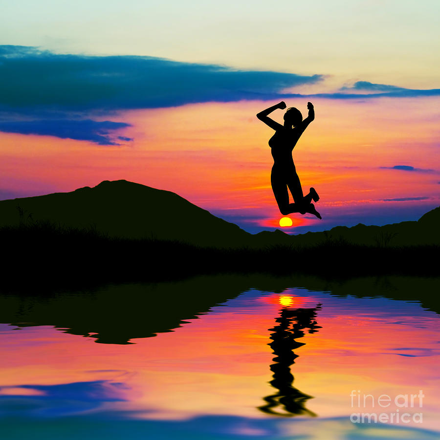 Silhouette of happy woman jumping at sunset Photograph by Michal Bednarek