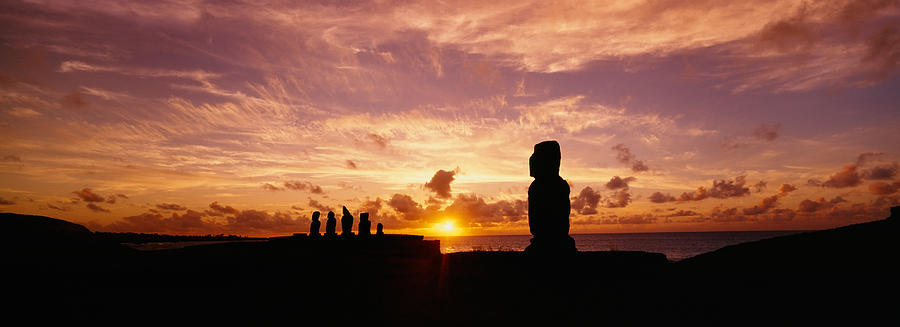 Silhouette Of Moai Statues At Dusk Photograph by Panoramic Images