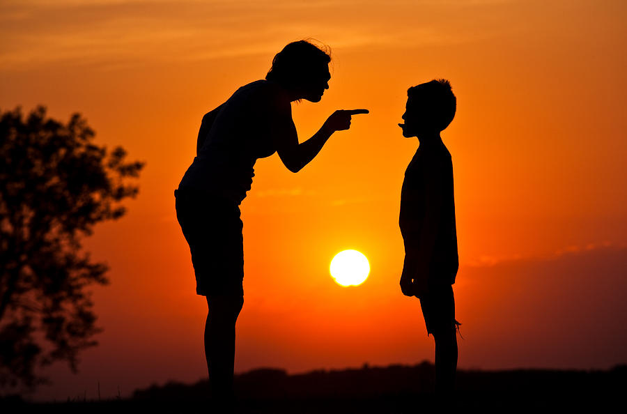 Silhouette of Mother Scolding A Disrespectful Child Photograph by ImagineGolf