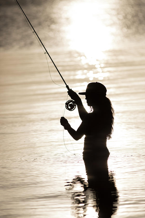 Silhouette Of Woman Fly-fishing Photograph by Chris Ross - Fine
