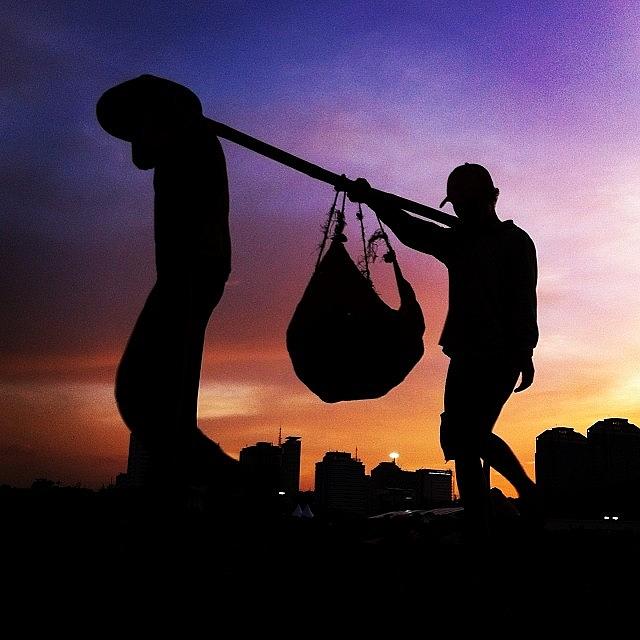 Sunset Photograph - Silhouette Of Worker #silhouette by Dani Daniar