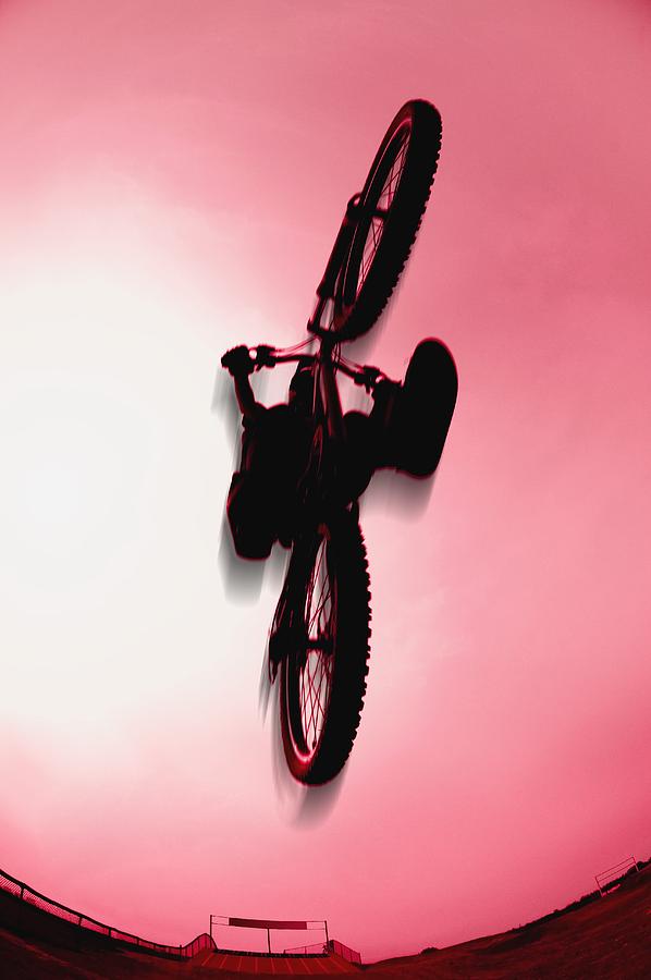 Silhouette Stunt Bike Rider Photograph