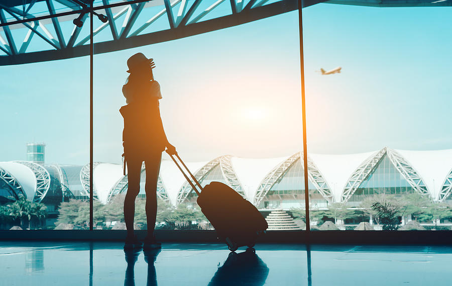 Silhouette Woman With Luggage Standing In Airport Photograph by Kiattisak Lamchan / EyeEm Silhouette Woman With Luggage Standing In Airport Photograph by Kiattisak Lamchan / EyeEm