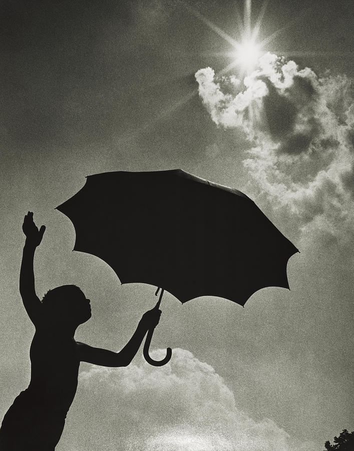Silhouetted Boy With Umbrella, C.1960s Photograph by H. Armstrong Roberts/ClassicStock