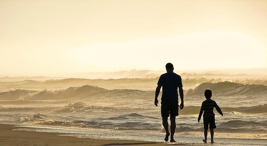 Silhouetted Father and Son Walk Beach  Photograph by Jo Ann Tomaselli