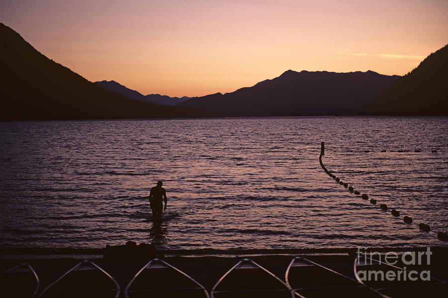 Silhouetted man Lake Wenatchee Photograph by Jim Corwin