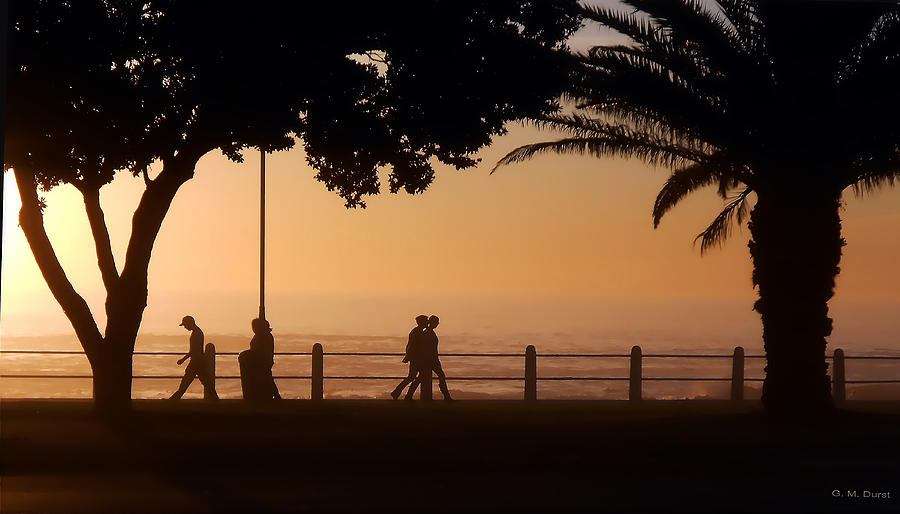 Sunset Photograph - Silhouettes Along the Promenade 1 by Michael Durst