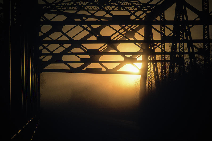 Abstract Photograph - Silhouettes Of Girders Of Bridge At Dusk by Ron Koeberer