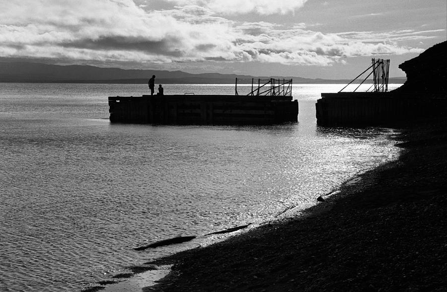 Silhouettes on broken pier Photograph by Arkady Kunysz