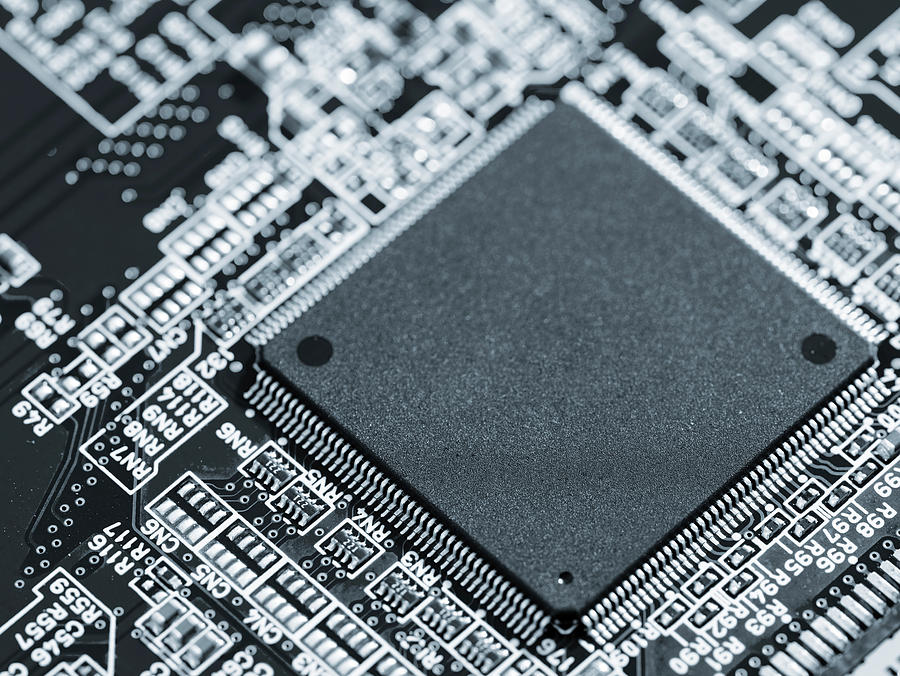 Silicon Chip On A Circuit Board Microprocessor Photograph by Wladimir