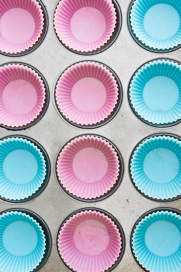 Cake Photograph - Silicon cup cake moulds by Tom Gowanlock