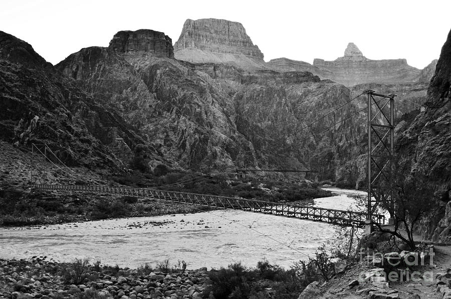 Silver and Black Bridges over Colorado River Bottom Grand Canyon National Park Black and White Photograph by Shawn OBrien