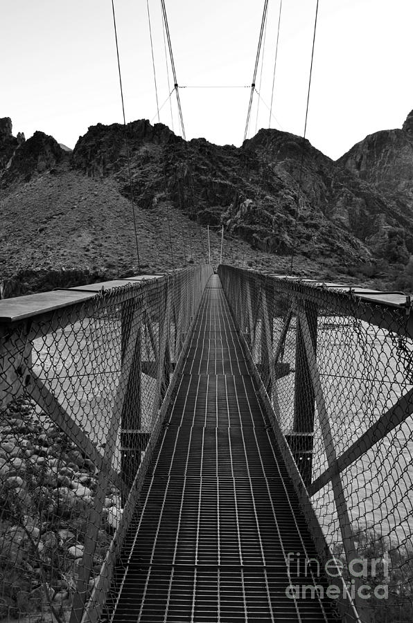 Silver Bridge over Colorado River at bottom of Grand Canyon National Park Black and White Photograph by Shawn OBrien