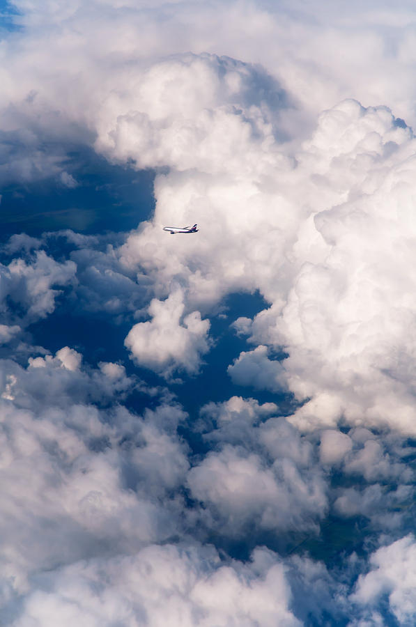 Silver Flight through the Clouds Photograph by Jenny Rainbow