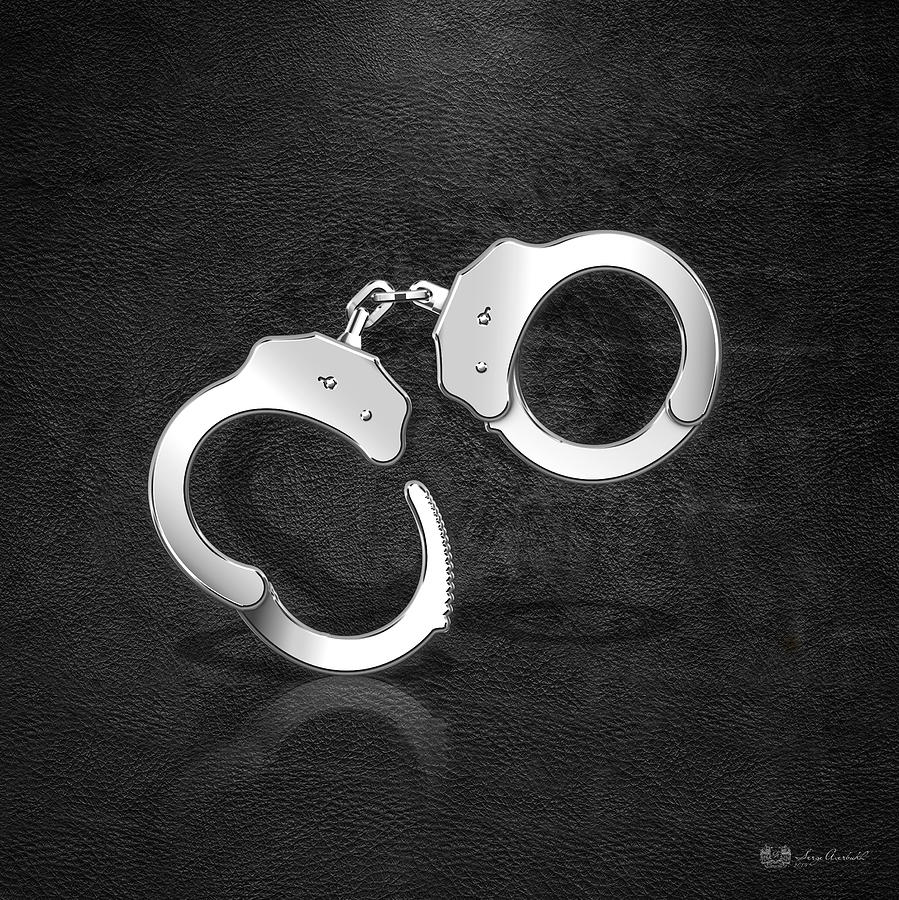 Silver Handcuffs on Black leather Background Digital Art by Serge Averbukh