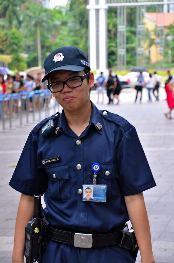 singapore-police-constable-smiles-outside-presidential-palace-imran-ahmed.jpg
