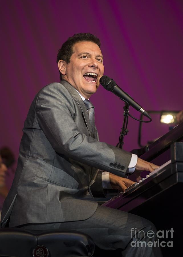 Michael Feinstein Photograph - Singer Michael Feinstein performing with the Pasadena Pops. by Jamie Pham