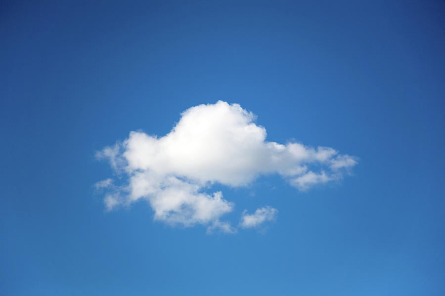 Single Cumulus Cloud In A Blue Sky Photograph by Snap Decision