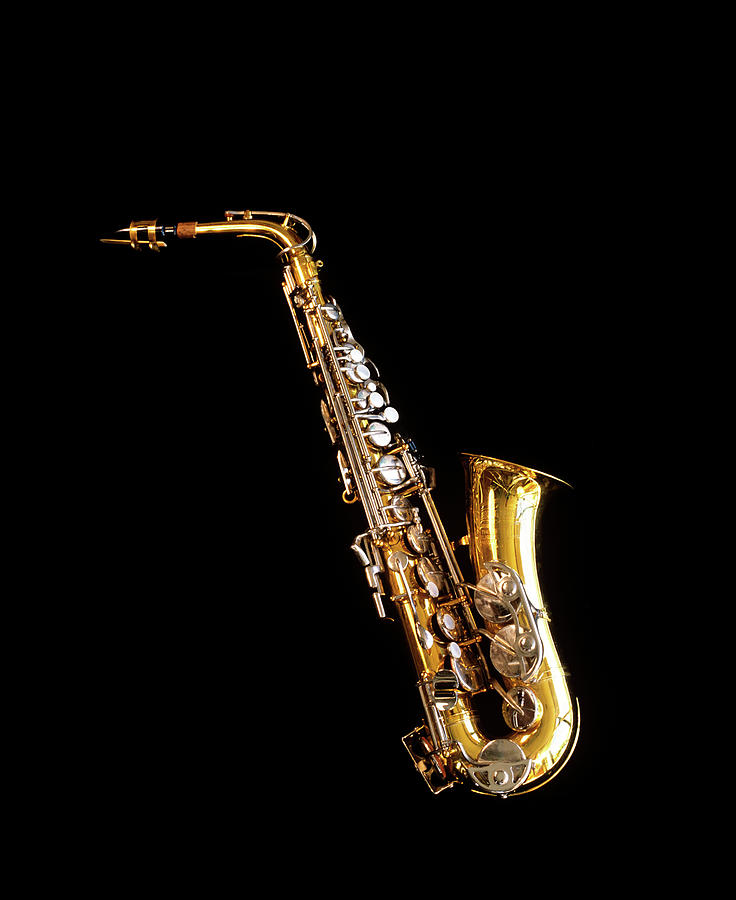 Jazz Photograph - Single Saxophone Against Black by Vintage Images