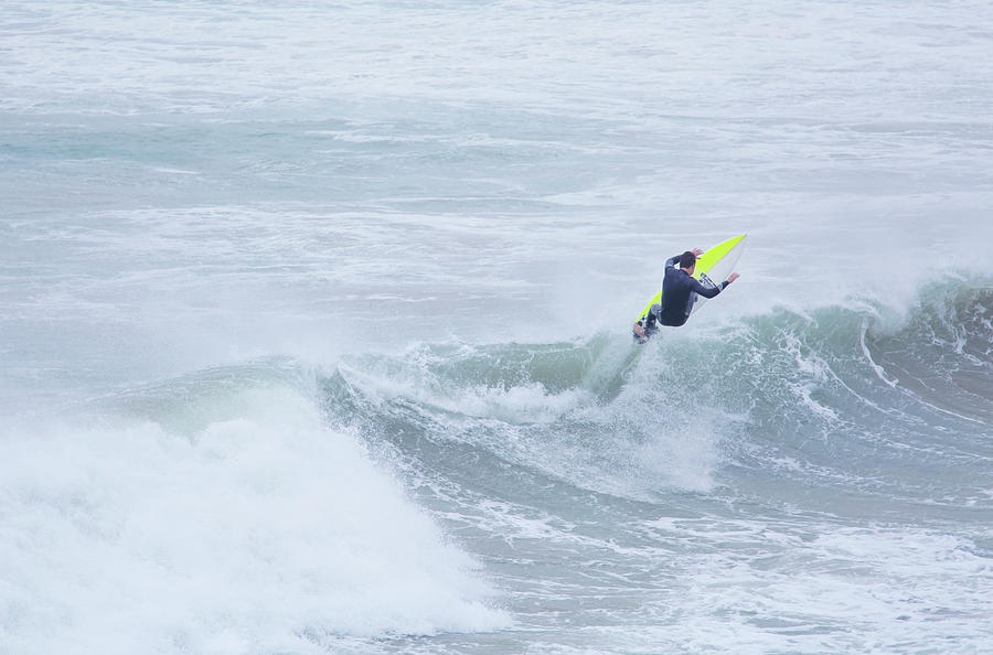 Single Surfer Riding A Wave In Autumn Photograph by James Silverthorne ...