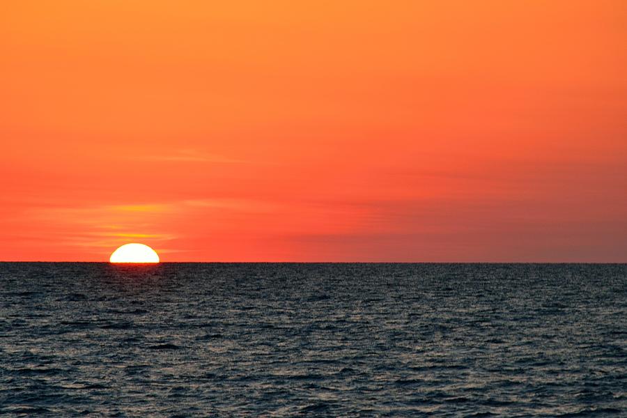 Sinking Sunset Photograph by Richard Zentner