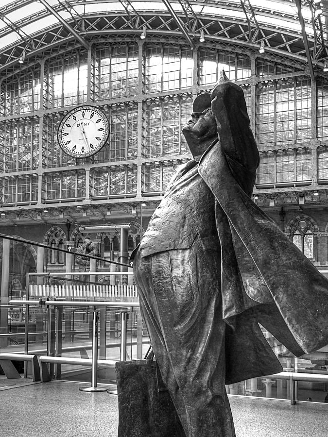 Sir John Betjeman Statue and Clock at St Pancras Station in Black and White Photograph by Gill Billington