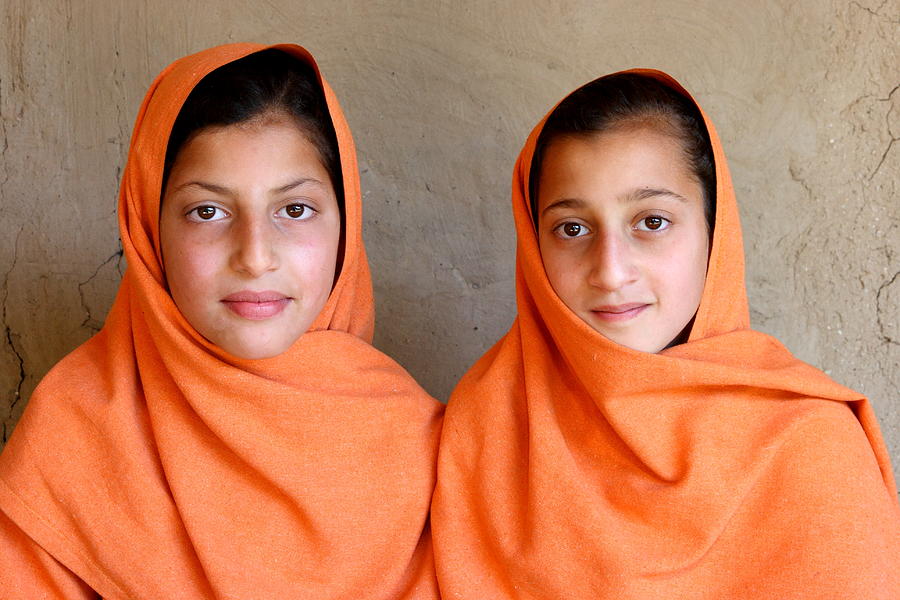 Sisters In Same Dress Photograph by Amir Mukhtar