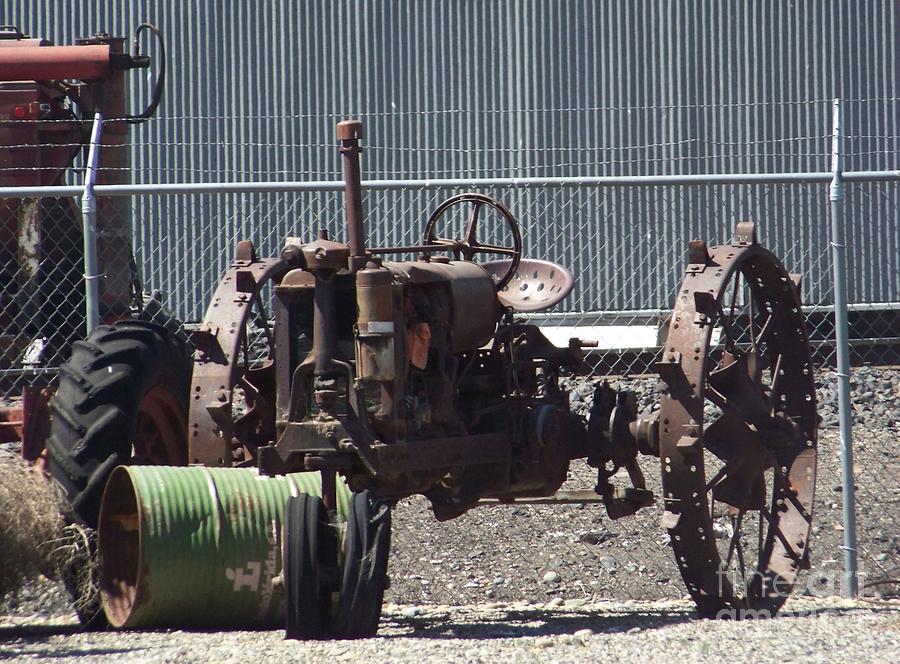 Skeleton Tractor Photograph by Charles Robinson