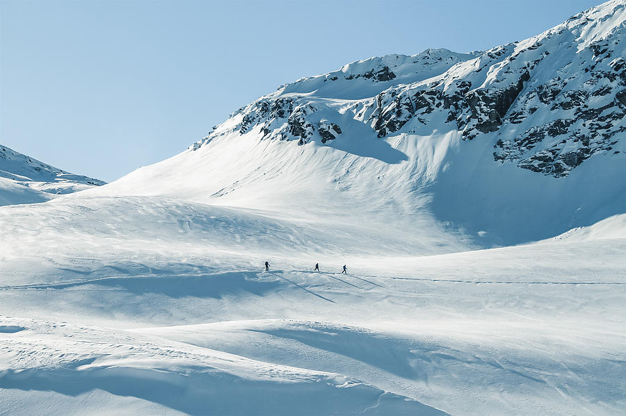 Winter Photograph - Ski Tourer On Big Mountains In A Winterlandscape  by Leander Nardin