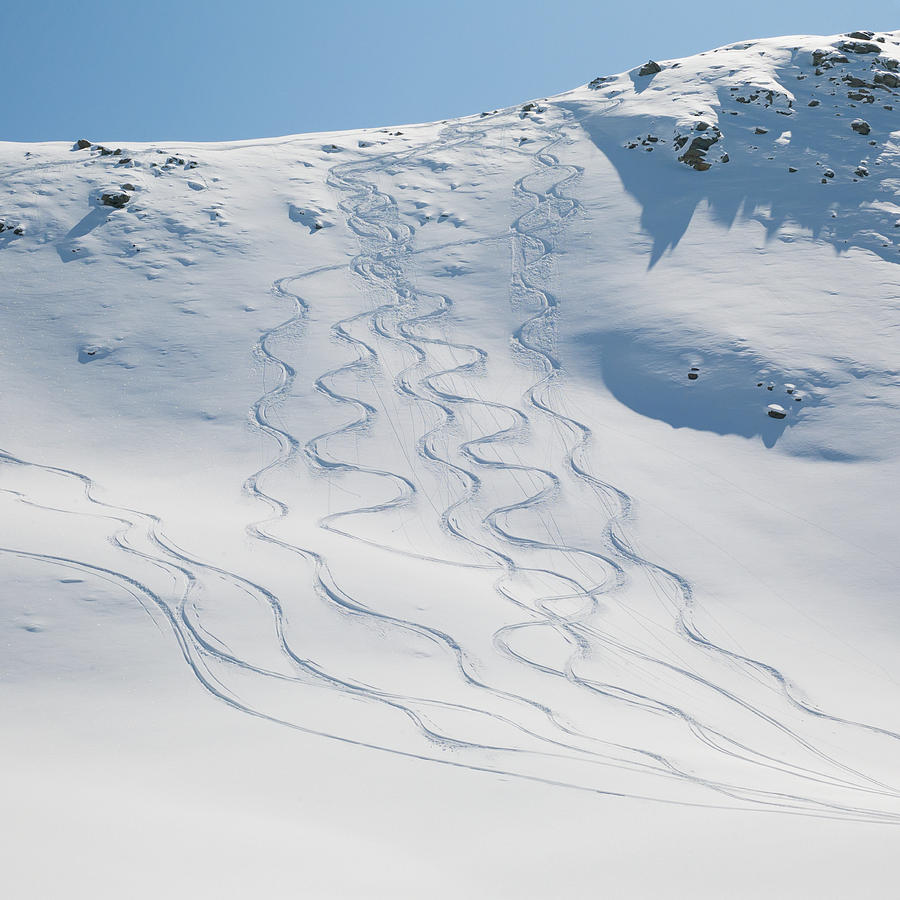 Ski Tracks In The Snow On A Mountain Photograph by Keith Levit