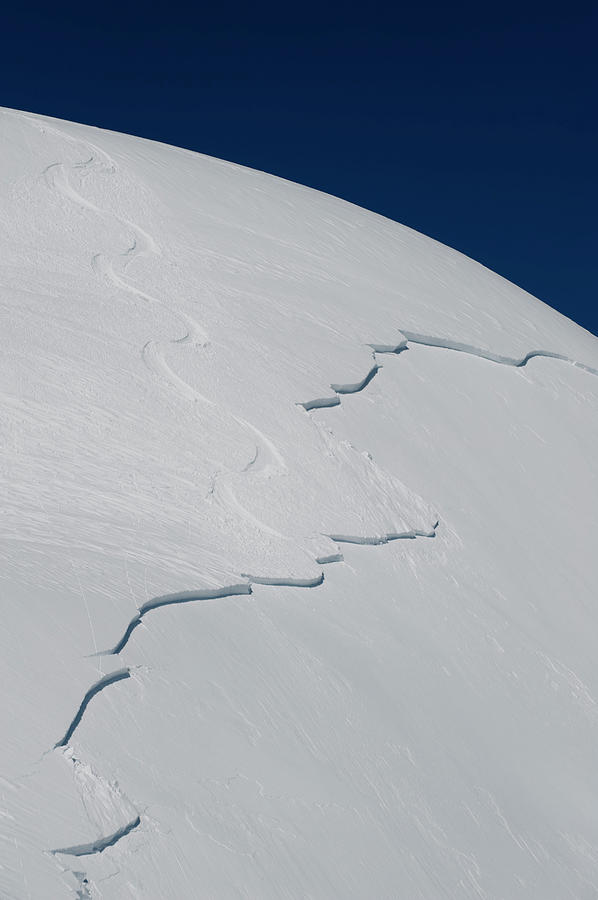 Winter Photograph - Ski Tracks Leading Into A Slab by Topher Donahue