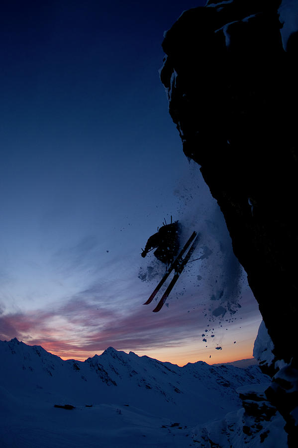 Sunset Photograph - Skier Jumping Off  A Cliff At Sunset by Adam Clark
