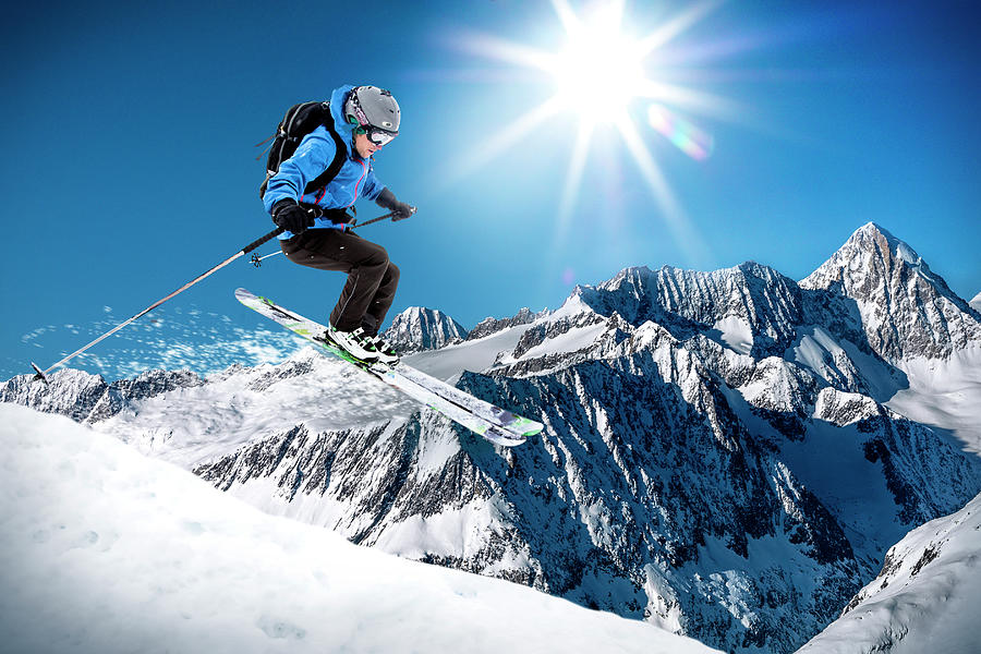 Skier Jumping On A Slope Photograph by Buena Vista Images
