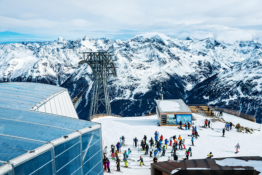 Skiers on top of ski resort Soelden, Tirol, Austria Photograph by Mbbirdy