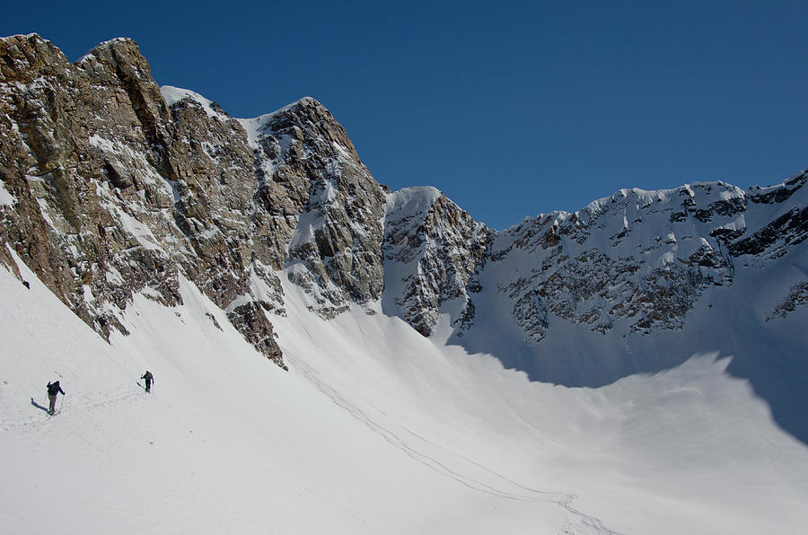 Salt Lake City Photograph - Skiers Traversing In Mill B South Fork by Howie Garber