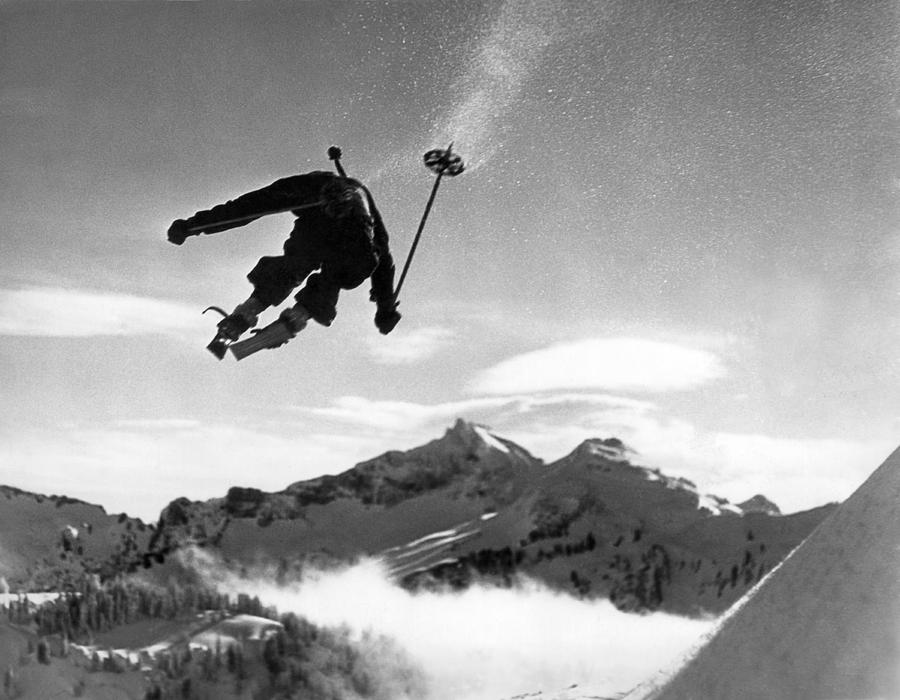 Athlete Photograph - Skiing Over Mt. Ranier by Underwood Archives