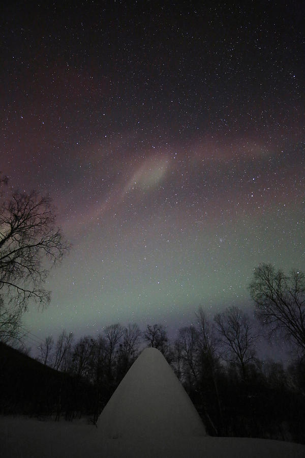 Sky lights above a hut Photograph by Pekka Sammallahti