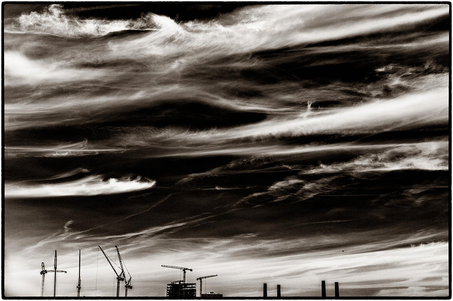 City Photograph - Sky Wisps and Cranes by Lenny Carter