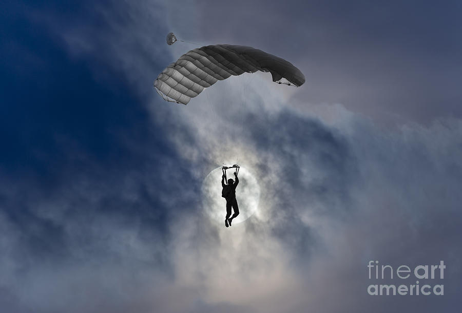 Skydiver and moon Photograph by Mats Silvan
