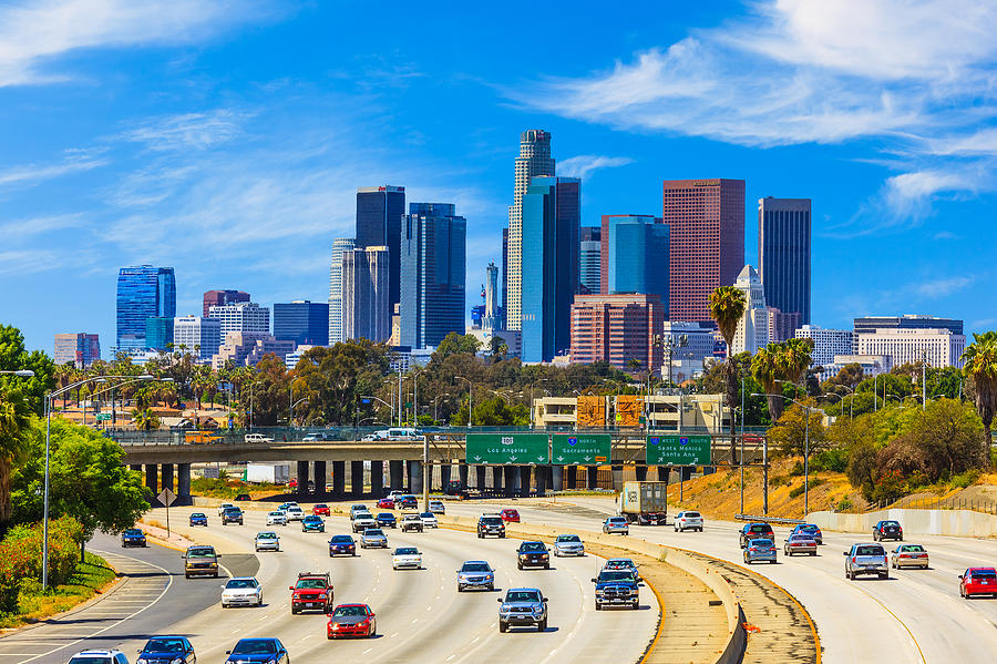 Skyline of Los Angeles with freeway traffic,CA Photograph by Ron_Thomas