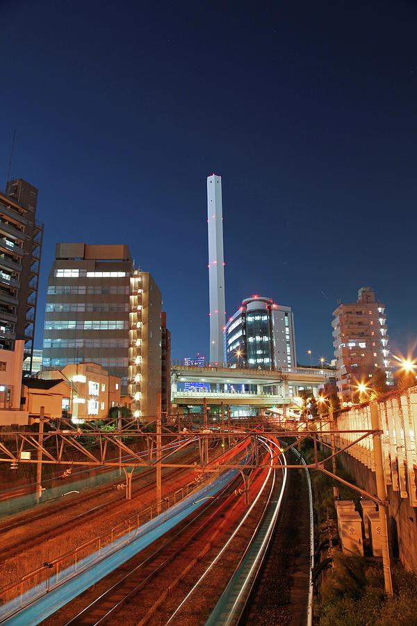 Skyline Of Tokyo Ikebukuro And  Train Photograph by Photography By Zhangxun