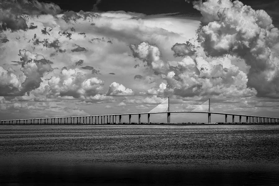 Pelican Photograph - Skyway Clouds by Marvin Spates