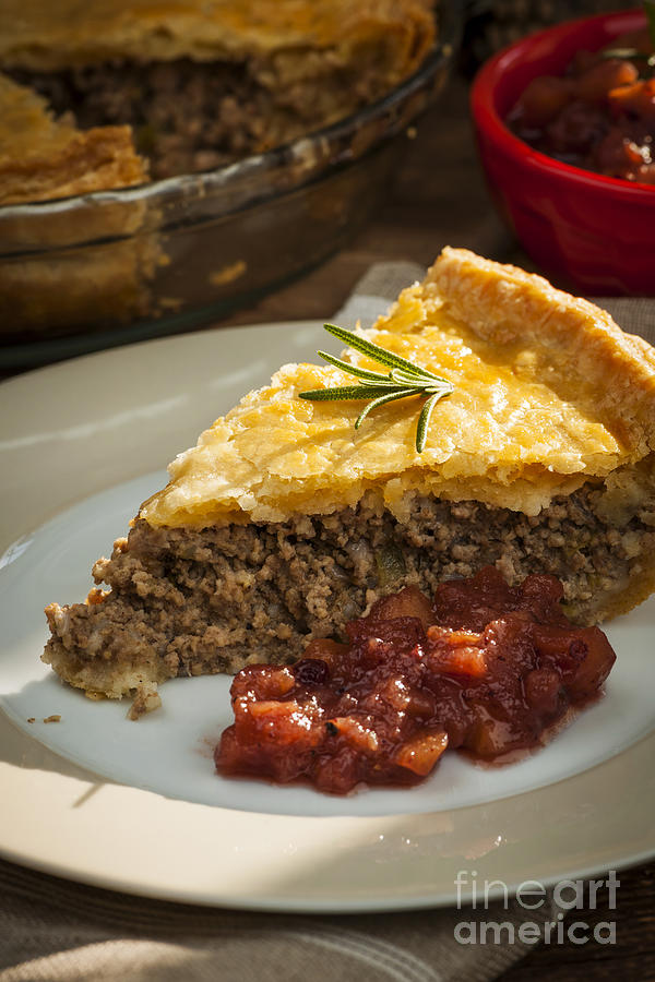 Slice of Tourtiere meat pie close up Photograph by Elena Elisseeva
