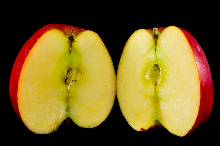 Sliced Apples On Black Background Photograph by Alex Grichenko