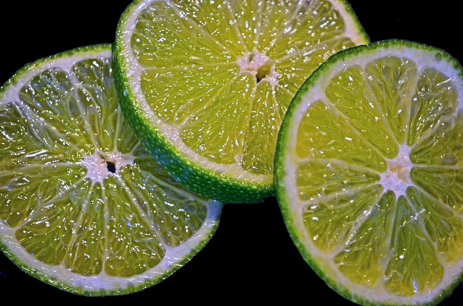 Sliced Limes Photograph by Sandi OReilly
