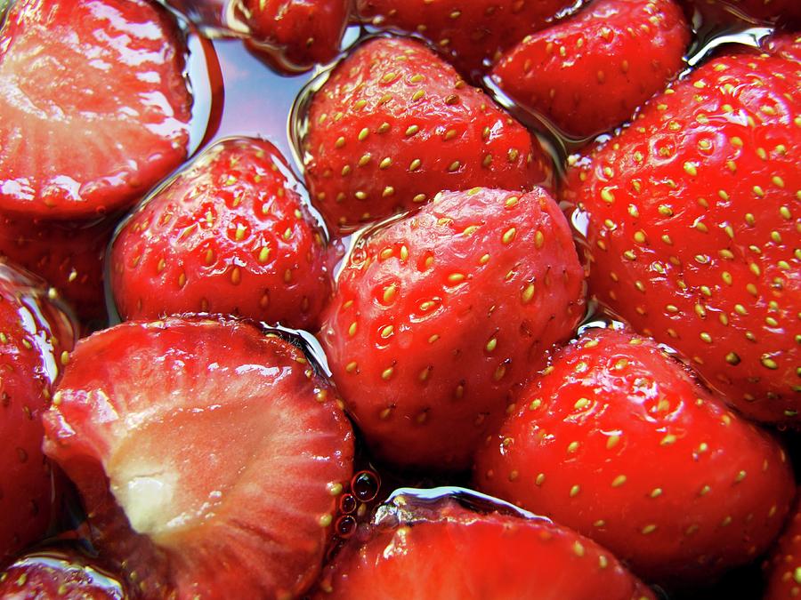 Sliced Strawberries In Sugary Juice Photograph by Ian Gowland/science ...