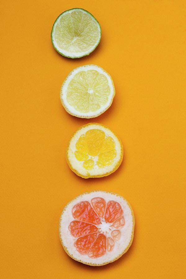 Slices Of Citrus Fruit Photograph by Science Photo Library Slices Of Citrus Fruit Photograph by Science Photo Library
